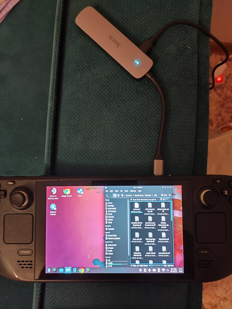 Со steam deck работает отлично, заряжает видео передает, диск, мышка, геймпад работает