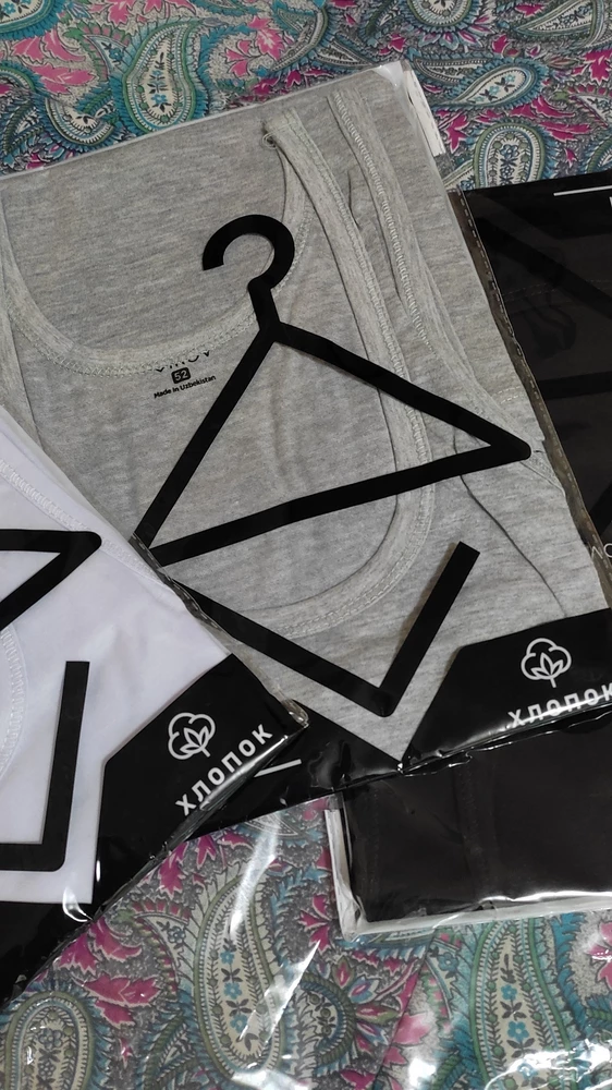 Прелесть. Каждая маечка упакована в отдельный пакет. Длина хорошая на рост 187.